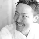 This is a profile picture of Tsutomu Kurihara.