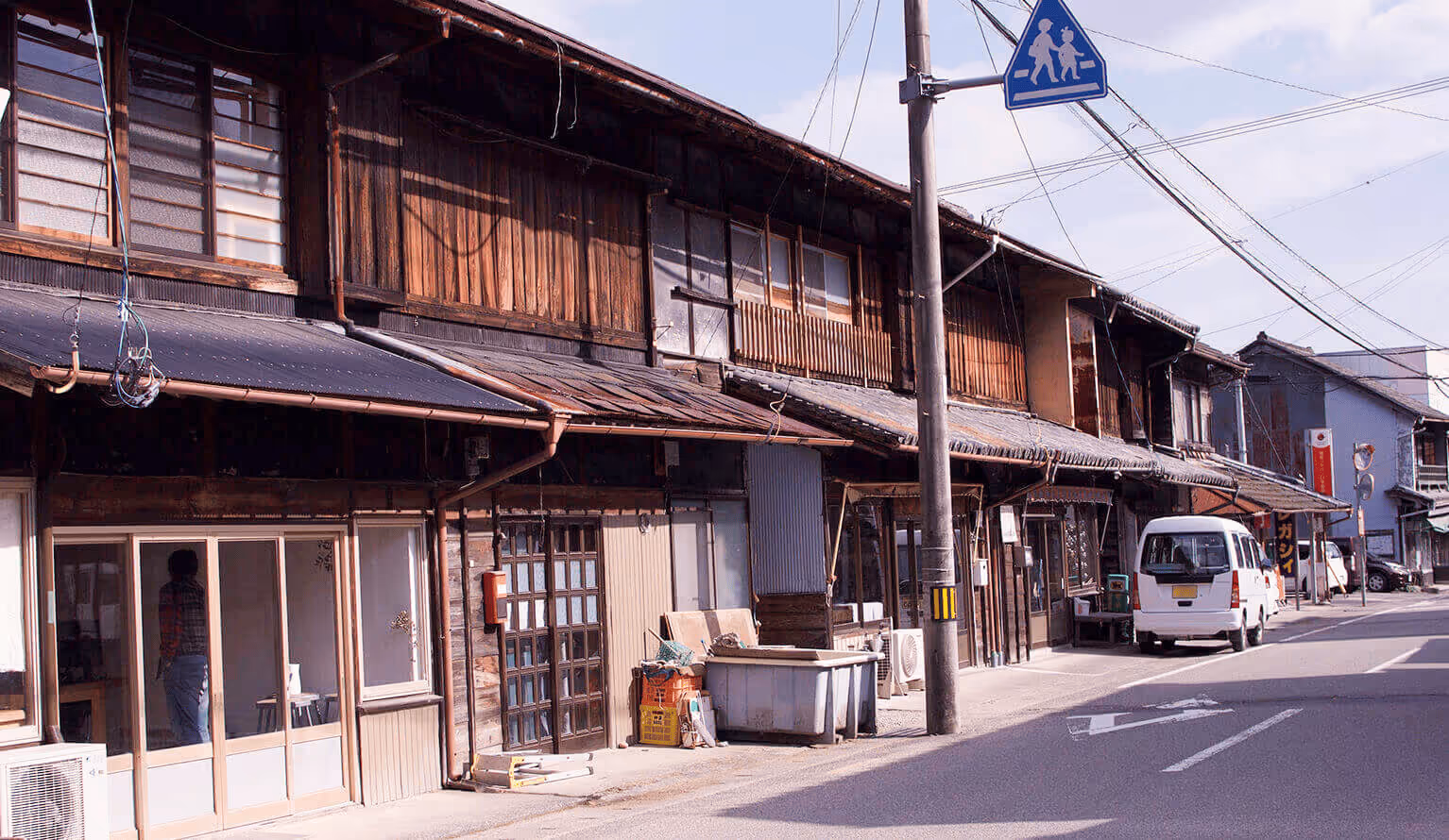 An old Japanese townscape. Lined with wooden buildings, the scenery evokes a sense of history.
